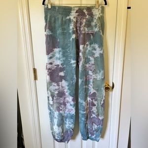 Nike Seasonal Classics acid wash loose fit cuffed sweatpants in purple/multi